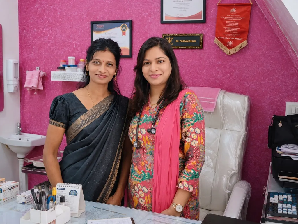 Dr. Poonam with clinic Patient in the consultation room at Dr. Poonam's Women's Clinic